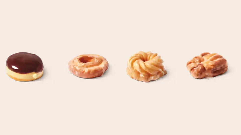 A Tim Hortons Boston Cream, Sour Cream Glazed, Honey Cruller and Apple Fritter donut