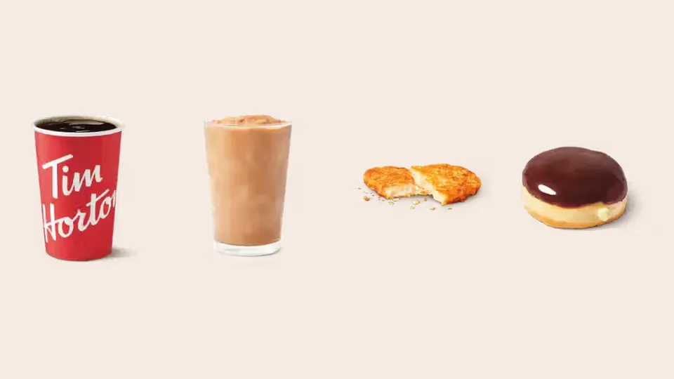 A Tim Hortons brewed coffee, Original Iced Capp, hash brown and Boston Cream donut